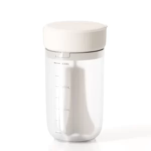 This image displays the foam maker with a transparent 400ml container and a sleek lid. Designed for durability and ease of use, it is perfect for creating foam using body wash or conditioner.