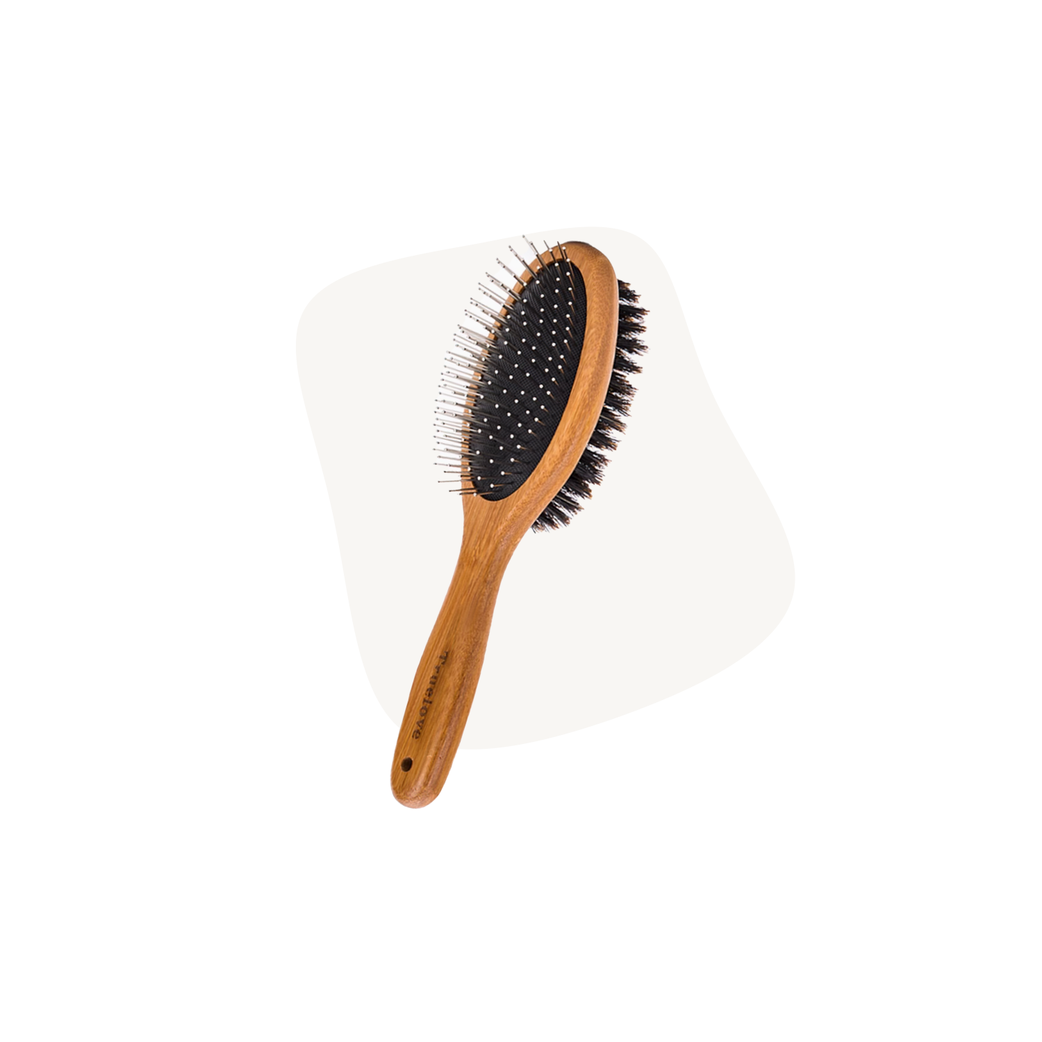 This image showcases the bamboo pet grooming brush with an ergonomic handle. The brush combines gentle nylon bristles and rounded metal pins, making it suitable for grooming pets with different coat textures.
