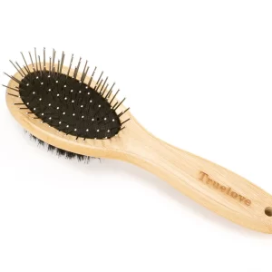 This photo showcases the detangling pin side of the Truelove bamboo double sided dog brush. Each pin is carefully designed with a rounded tip to gently work through knots and mats without scratching or irritating your dog's skin, making grooming a pleasant, massage-like activity.